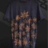 an image of a black t-shirt with copper colored leaf graphics over it