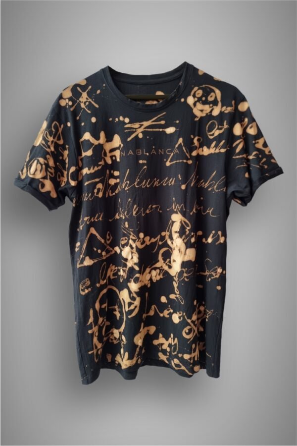 an image of a black t-shirt with copper colored handwriting graphics over it