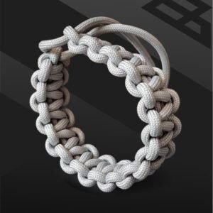 silver color paracord bracelet which resembles Tom Hardy's paracord bracelet from the movie Mad Max Fury Road