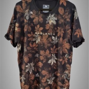 an image of a black t-shirt with copper colored leaf graphics over it