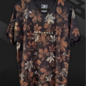 an image of a black t-shirt with copper colored leaf graphics over it