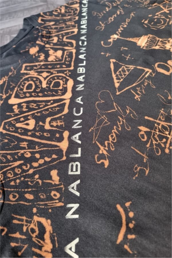 black t-shirt with handmade Paris city inspired graphics all over with bleach