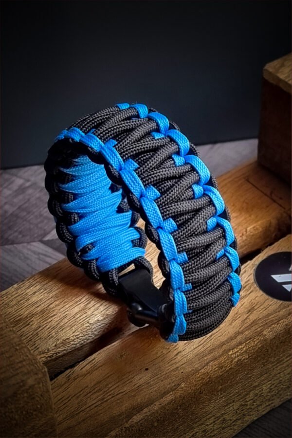 double layer handmade paracord bracelet made with sky blue and black paracord with shackle buckle