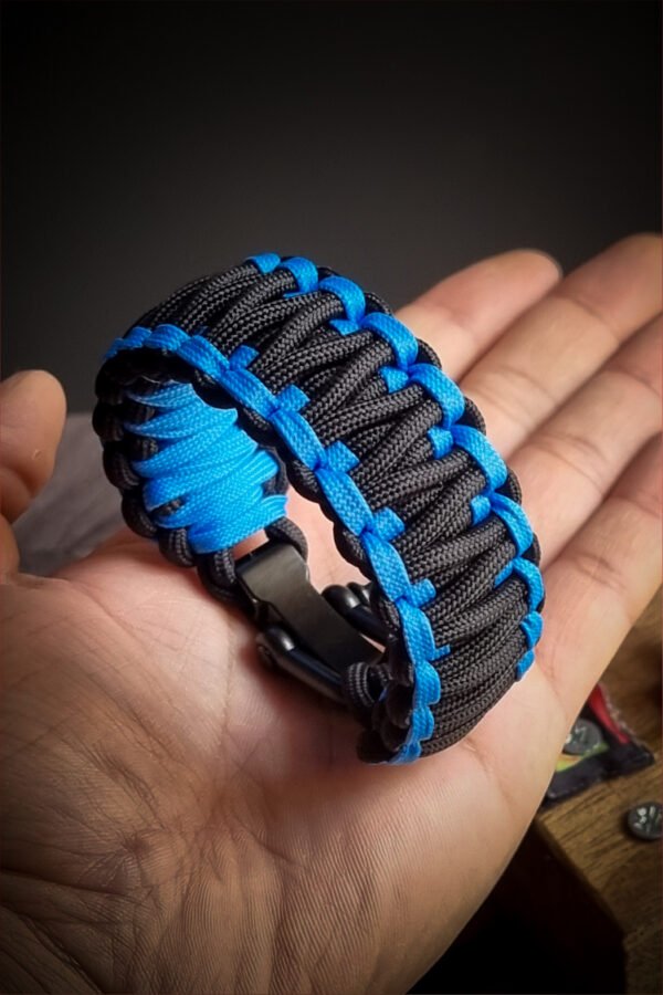 double layer handmade paracord bracelet made with sky blue and black paracord with shackle buckle