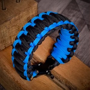 double layer handmade paracord bracelet made with sky blue and black paracord with shackle buckle