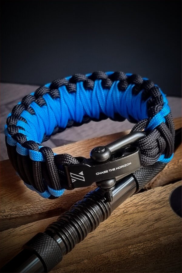 double layer handmade paracord bracelet made with sky blue and black paracord with shackle buckle