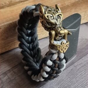 mythical Bear tribal buckle paracord bracelet with silver, gold and black paracord