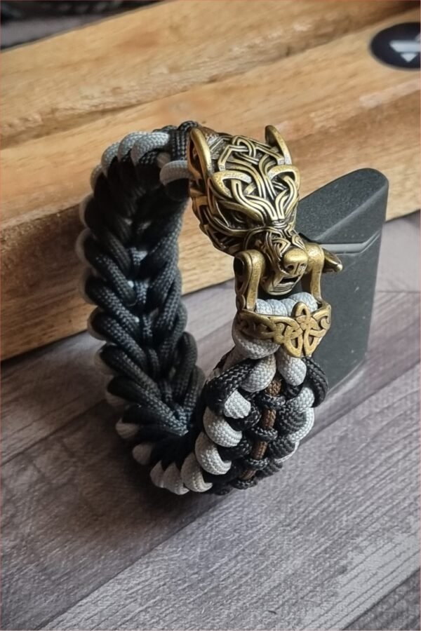 mythical Bear tribal buckle paracord bracelet with silver, gold and black paracord