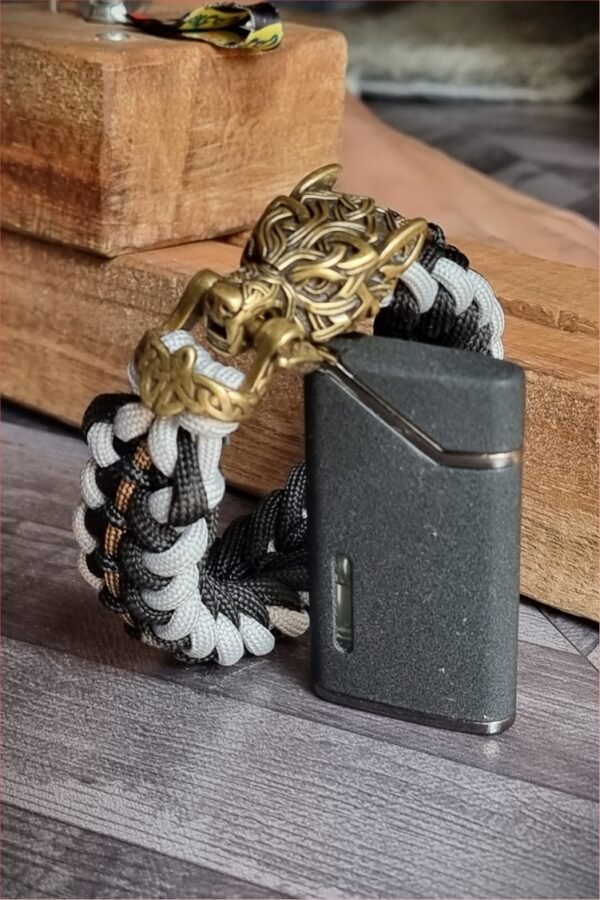 mythical Bear tribal buckle paracord bracelet with silver, gold and black paracord