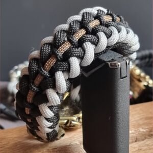 mythical Bear tribal buckle paracord bracelet with silver, gold and black paracord