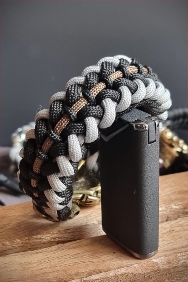 mythical Bear tribal buckle paracord bracelet with silver, gold and black paracord