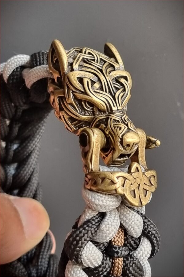 mythical Bear tribal buckle paracord bracelet with silver, gold and black paracord