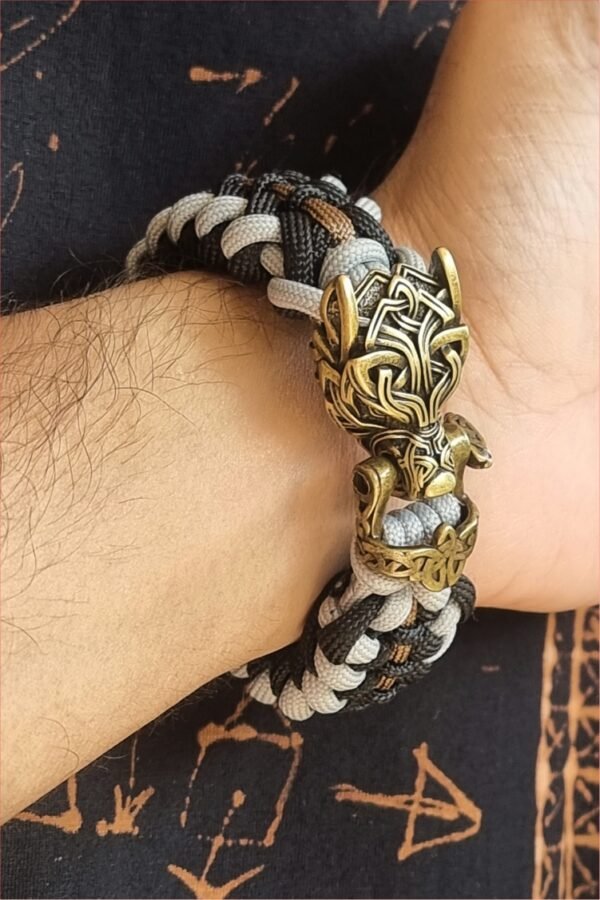 mythical Bear tribal buckle paracord bracelet with silver, gold and black paracord