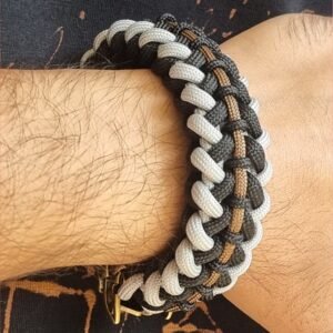 mythical Bear tribal buckle paracord bracelet with silver, gold and black paracord