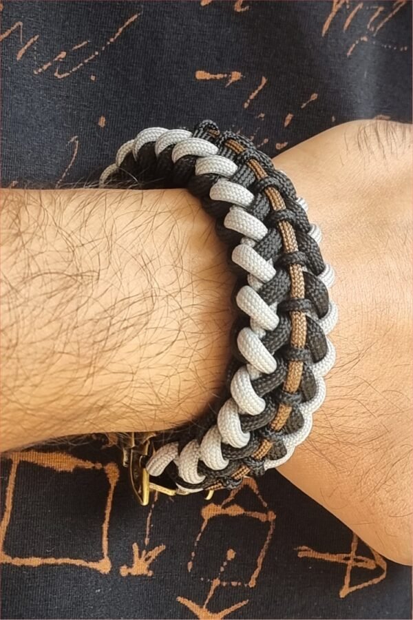 mythical Bear tribal buckle paracord bracelet with silver, gold and black paracord