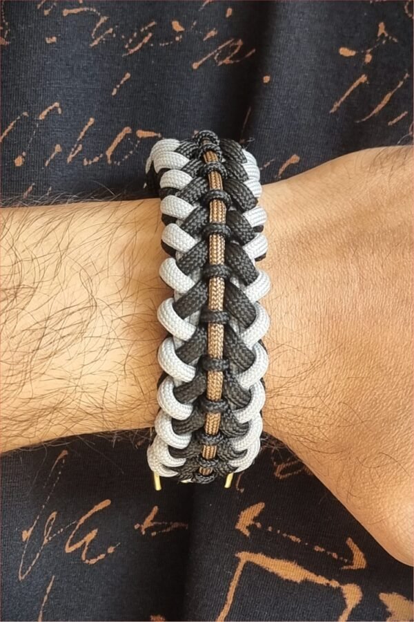 mythical Bear tribal buckle paracord bracelet with silver, gold and black paracord