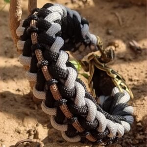 mythical Bear tribal buckle paracord bracelet with silver, gold and black paracord