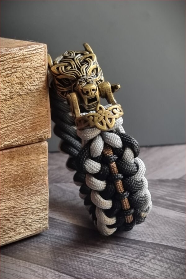 mythical Bear tribal buckle paracord bracelet with silver, gold and black paracord