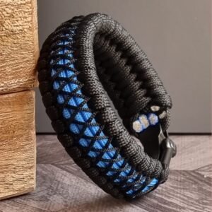 handmade survival paracord bracelet made of black, light blue paracords with shackle buckle