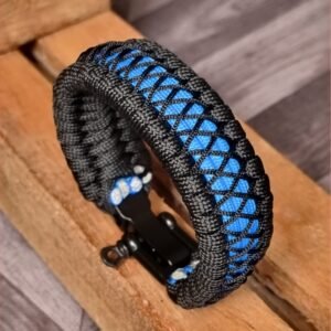 handmade survival paracord bracelet made of black, light blue paracords with shackle buckle