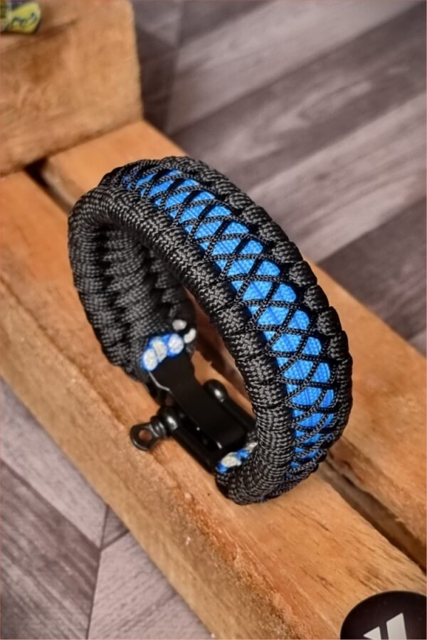 handmade survival paracord bracelet made of black, light blue paracords with shackle buckle