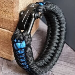 handmade survival paracord bracelet made of black, light blue paracords with shackle buckle