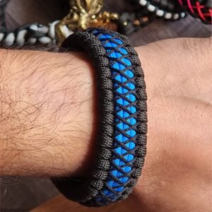 handmade survival paracord bracelet made of black, light blue paracords with shackle buckle