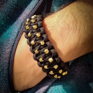 mythical Bear tribal buckle paracord bracelet with silver, gold and black paracord