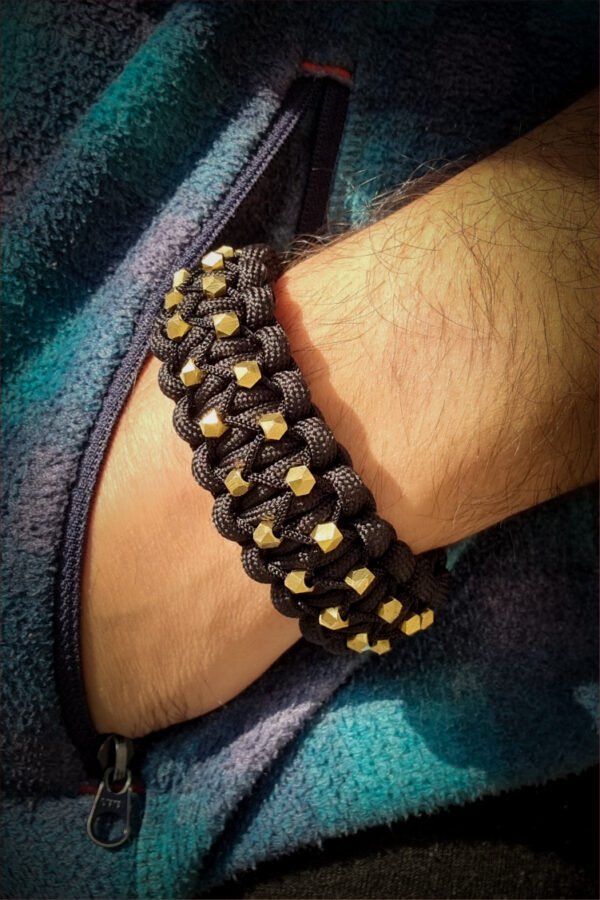 mythical Bear tribal buckle paracord bracelet with silver, gold and black paracord