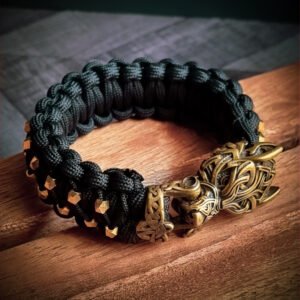 mythical Bear tribal buckle paracord bracelet with silver, gold and black paracord