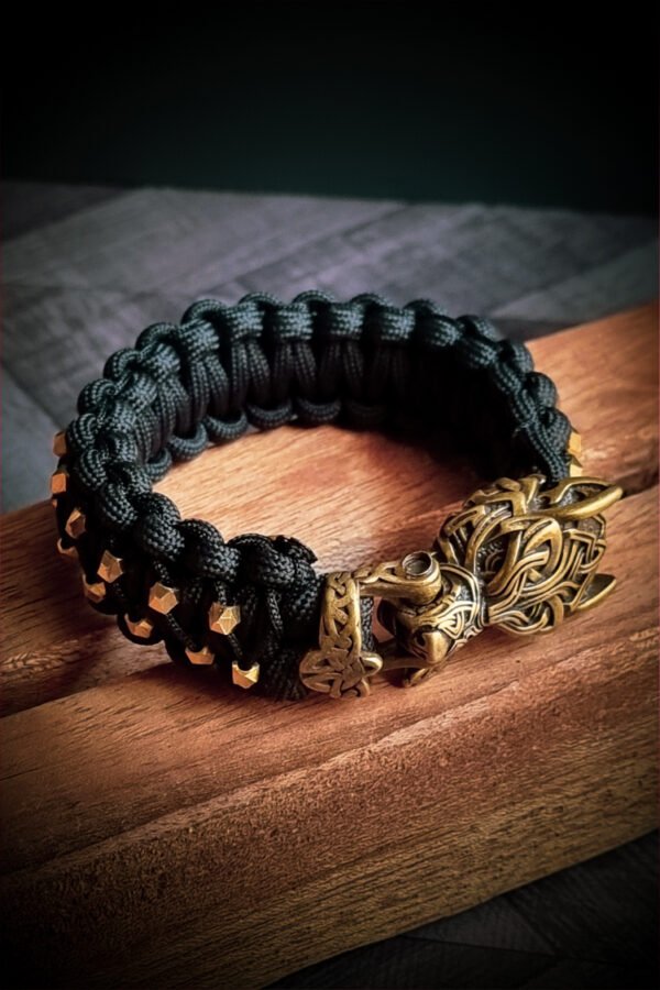 mythical Bear tribal buckle paracord bracelet with silver, gold and black paracord