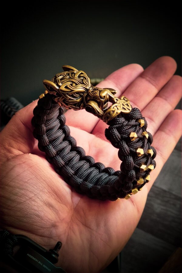 mythical Bear tribal buckle paracord bracelet with silver, gold and black paracord