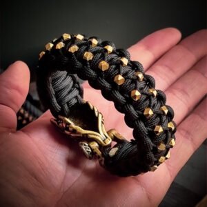 mythical Bear tribal buckle paracord bracelet with silver, gold and black paracord