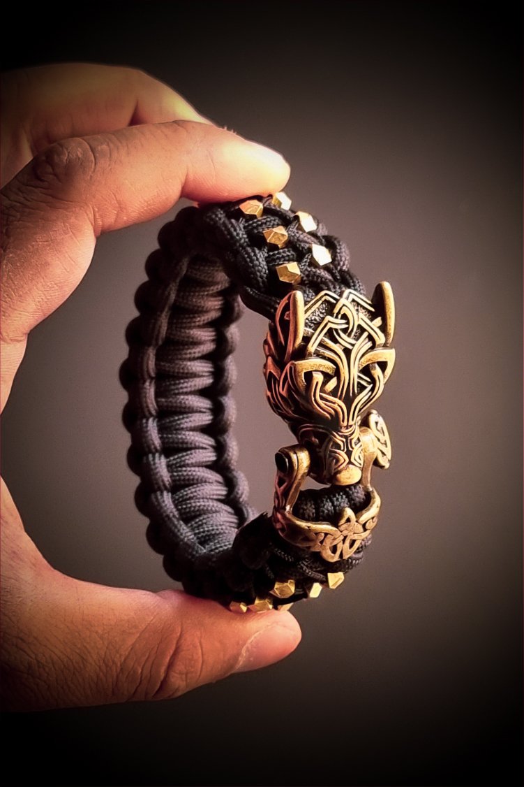 mythical Bear tribal buckle paracord bracelet with silver, gold and black paracord