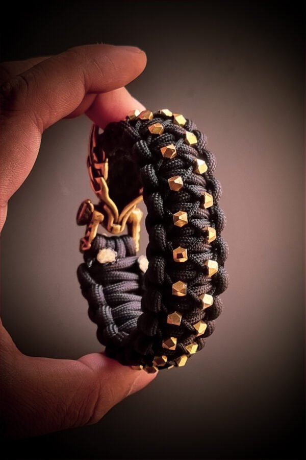 mythical Bear tribal buckle paracord bracelet with silver, gold and black paracord