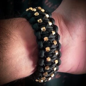 mythical Bear tribal buckle paracord bracelet with silver, gold and black paracord