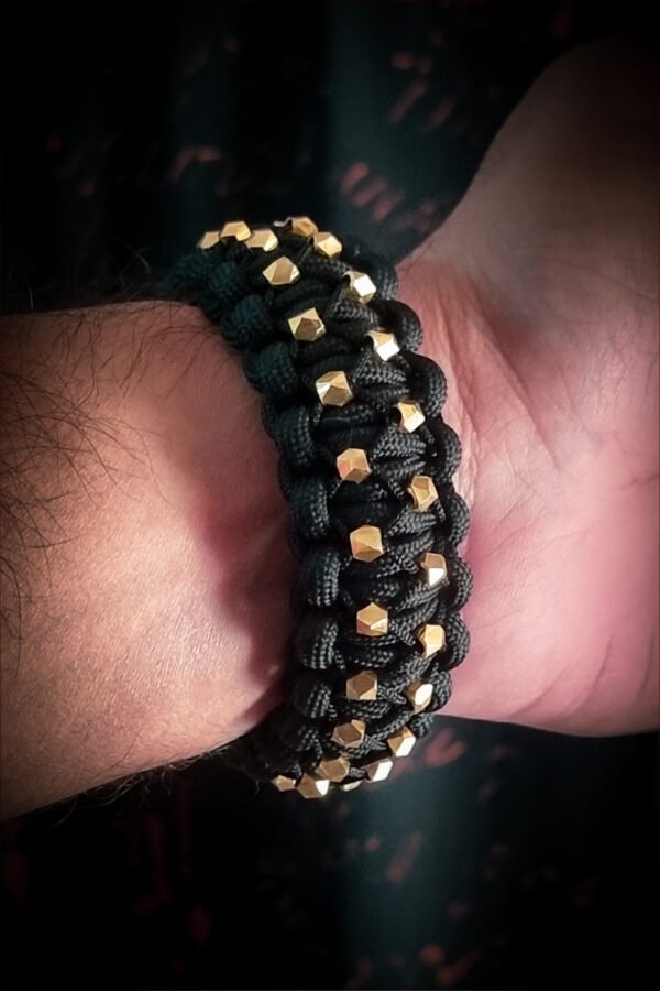 mythical Bear tribal buckle paracord bracelet with silver, gold and black paracord