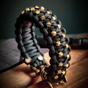 mythical Bear tribal buckle paracord bracelet with silver, gold and black paracord