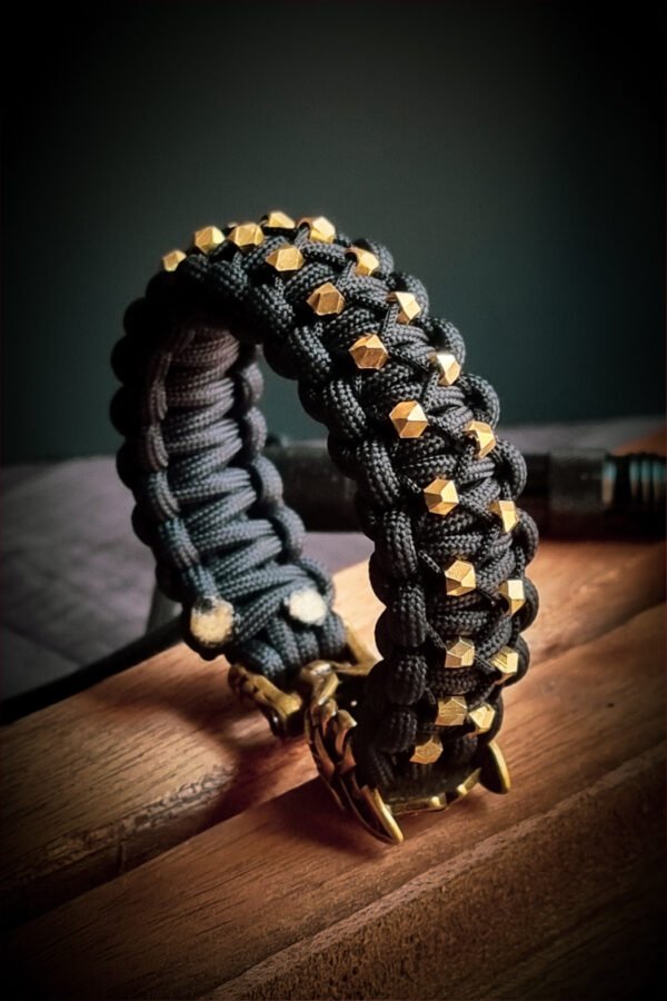 mythical Bear tribal buckle paracord bracelet with silver, gold and black paracord