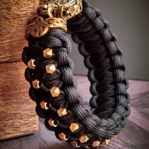 mythical Bear tribal buckle paracord bracelet with silver, gold and black paracord