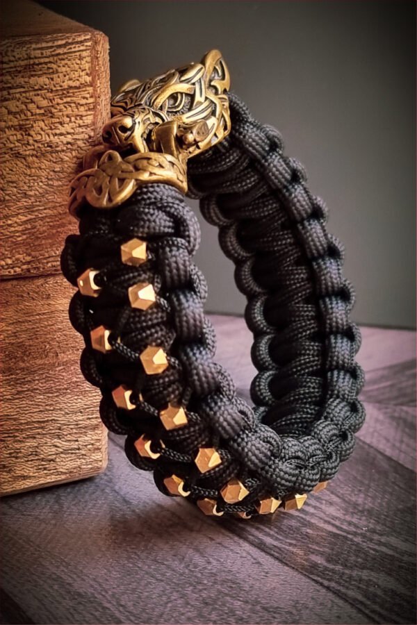 mythical Bear tribal buckle paracord bracelet with silver, gold and black paracord