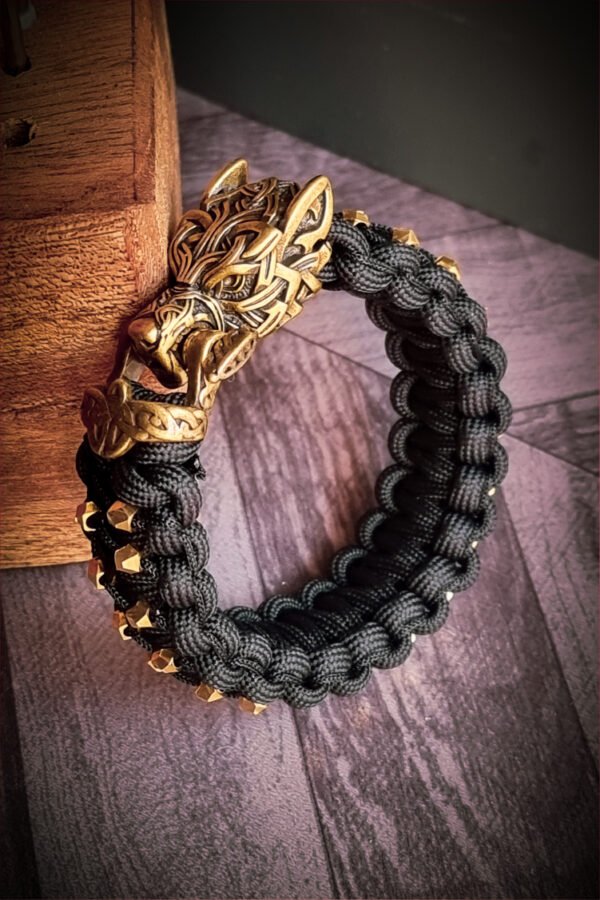 mythical Bear tribal buckle paracord bracelet with silver, gold and black paracord