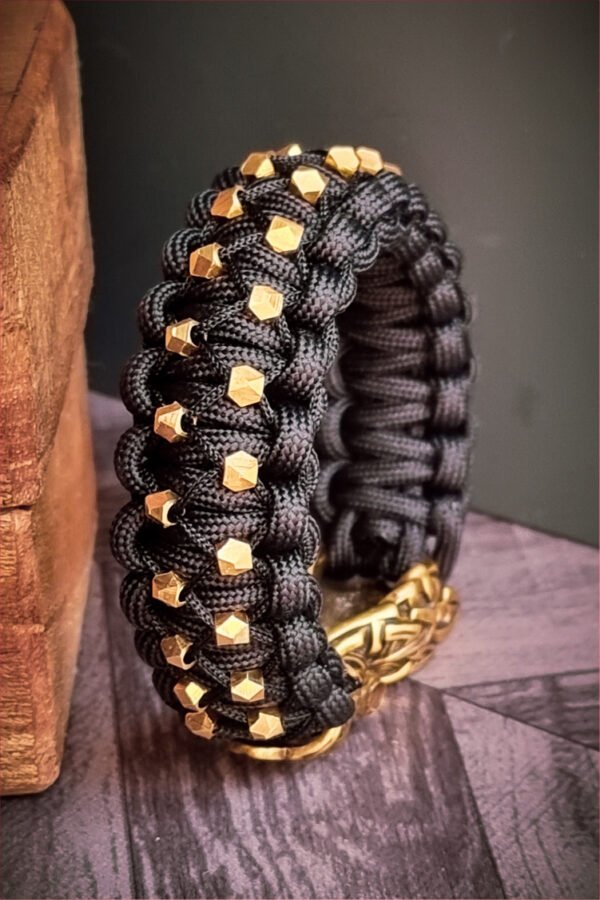 mythical Bear tribal buckle paracord bracelet with silver, gold and black paracord