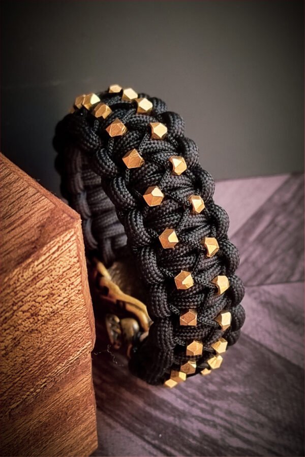 mythical Bear tribal buckle paracord bracelet with silver, gold and black paracord