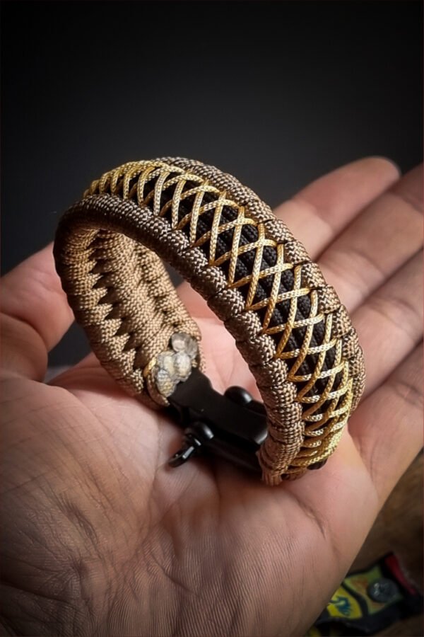 handmade paracord bracelet from Brown and golden paracord type 3 with shackle bukle