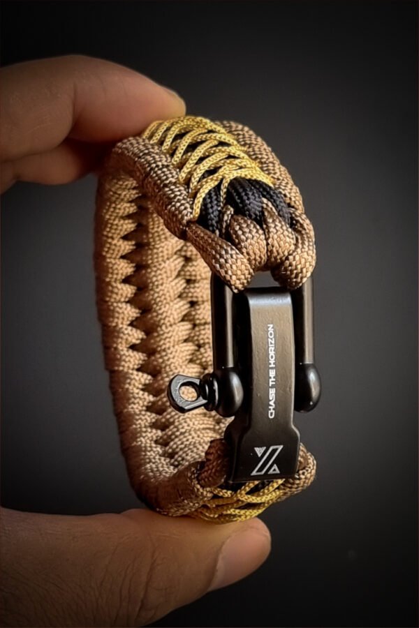 handmade paracord bracelet from Brown and golden paracord type 3 with shackle bukle