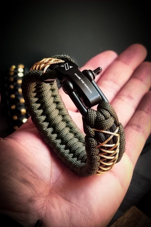 handmade paracord bracelet from green and golden paracord type 3 with shackle bukle