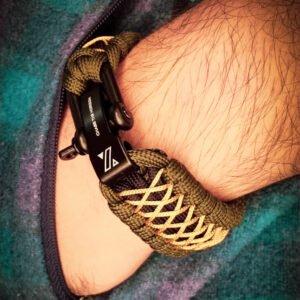 handmade paracord bracelet from green and golden paracord type 3 with shackle bukle