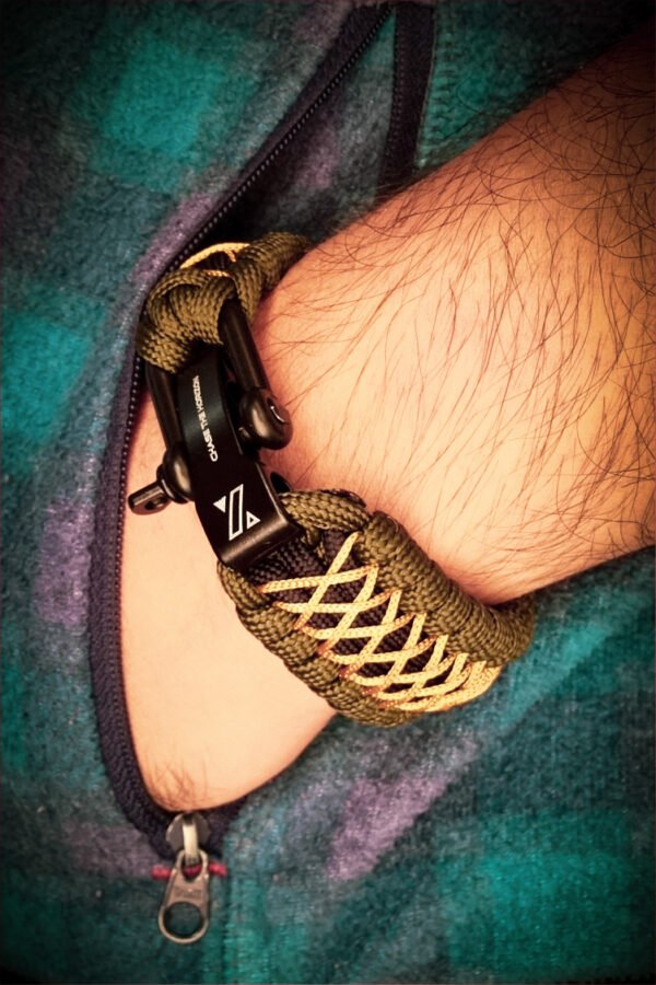 handmade paracord bracelet from green and golden paracord type 3 with shackle bukle