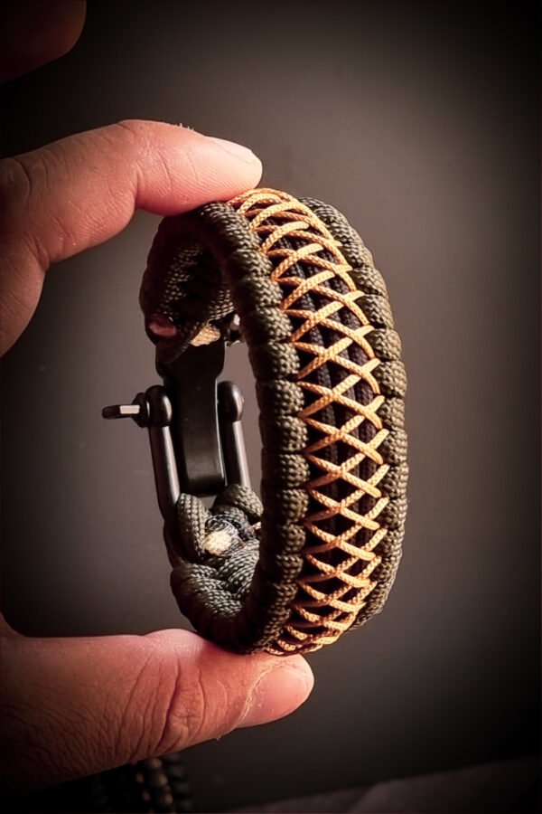 handmade paracord bracelet from green and golden paracord type 3 with shackle bukle